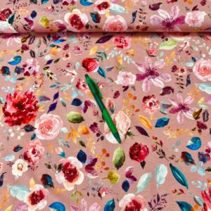 világos mályva alapon színes virág mintás holland pólóanyag 90 cm-es darab
