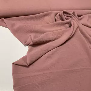 Mályvás rózsaszín színű riviéra (mega krepa) anyag 115 cm-es darab