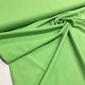 Élénk zöld színű pamutdzsörzé