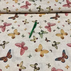 Bézs alapon színes pillangó mintás loneta vászon
