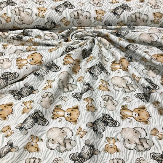 fehér alapon szürke, drapp bébi zebra, elefánt mintás pamut futter szabadidő anyag 110 cm-es darab